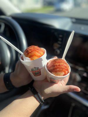 Pineapple and mango with tajin and chamoy .