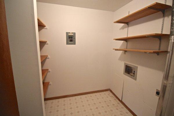 Large utility closet room, for full size washer & dryer, lots of deep pantry shelves!