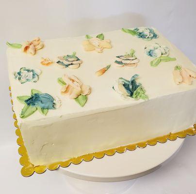 Palette knife flowered sheet cake to match the wedding cake.