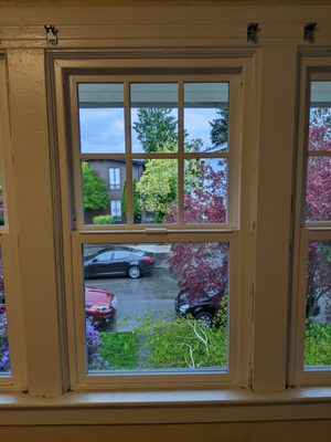 New, acoustic-grade double pane windows with grids to match existing aesthetic - after!