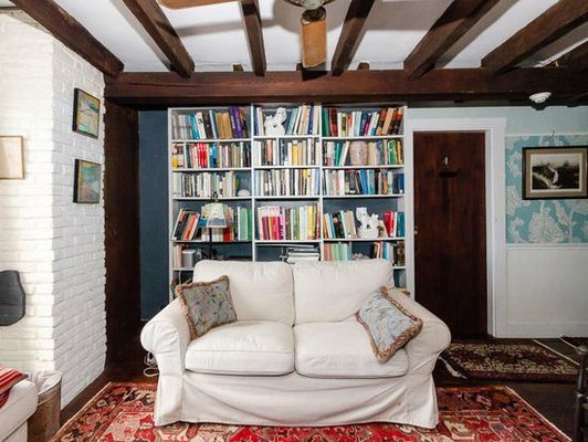 Library and tv in the second floor study