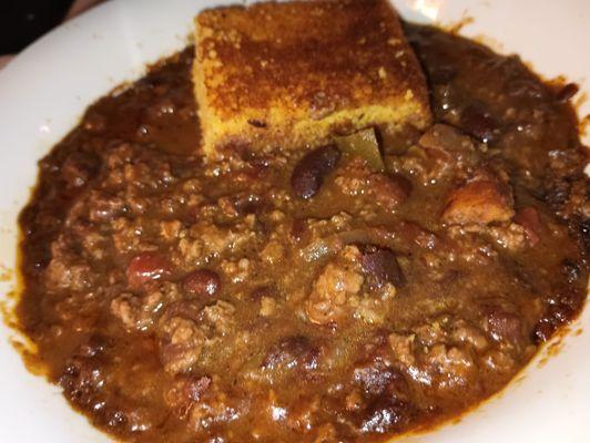 Homemade from scratch slow-simmered well-seasoned chili Daily LUNCH SPECIAL of the Day with corn bread