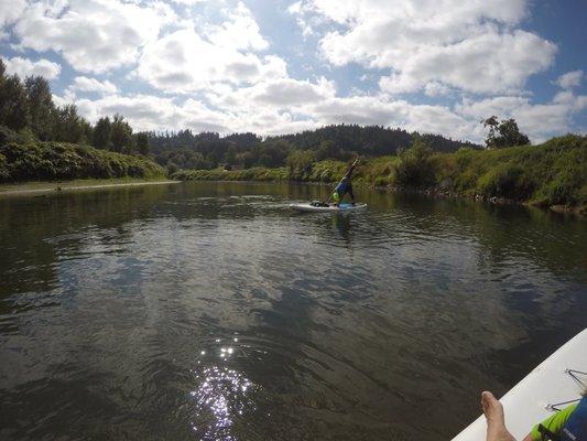 Paddle up a class 1 river and pose on the way down for a good workout.