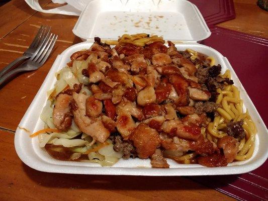 Chicken and beef teriyaki with vegetables and noodles. Extra sauce