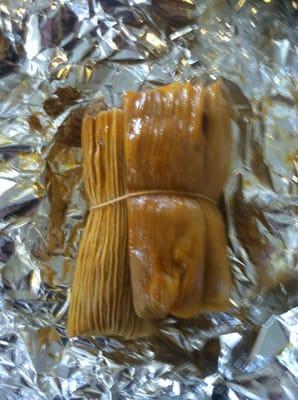 Half a dozen tamales ready to eat.