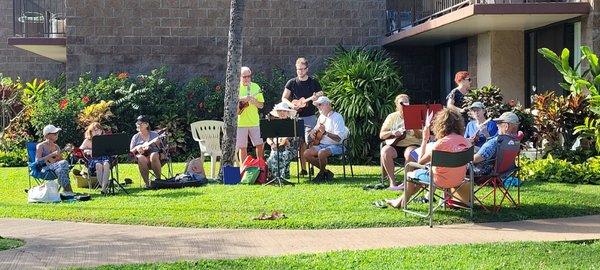 Enjoying an ukulele jam session.