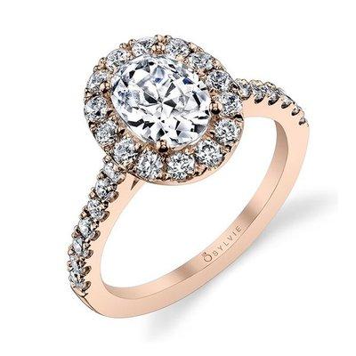 Popular oval style engagement ring made in 14k rose gold and set with oval diamond.