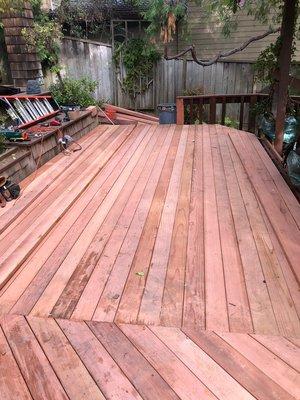 Before and after pictures of a deck job In Bellevue