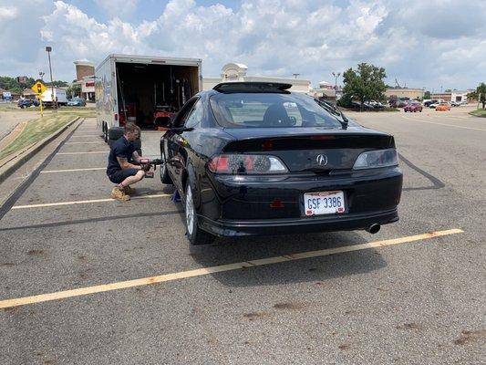 Roadrunner Tires starting the process of a mount and balance