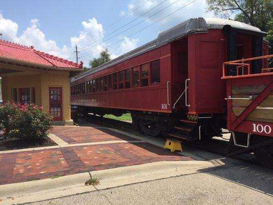 Back of train and old Shell station