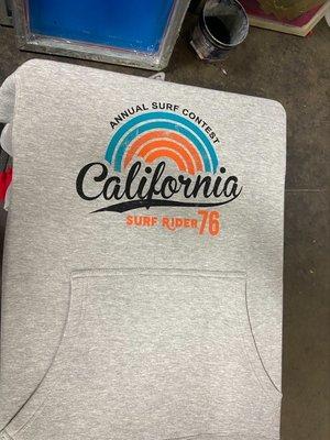 Custom sweater made with screen printing.