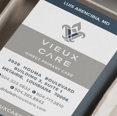 Detail of business card for Vieux Care, a direct primary care company based in Louisiana.