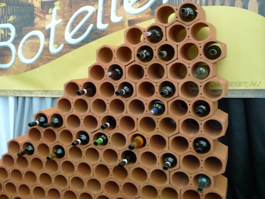 some stackable terracotta wine racks, which are commonly used in Spain.