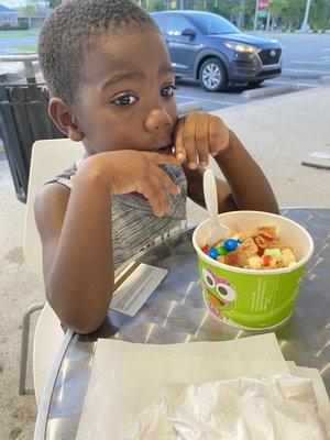 Grammy's Fav Grandson enjoying Sweet Frog!