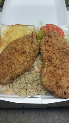 Two thick pork chop with freshly made shrimp fried rice, salad and butter toast for $8.49.