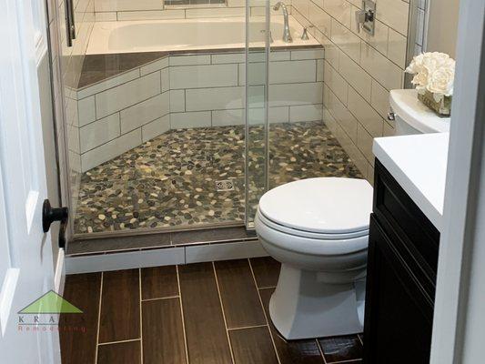 Mosaic tile on a Schluter installed bathroom shower floor