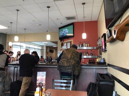 From our corner window seat at Capitol City Tavern looking at the bar!