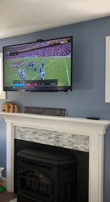 Wall mounting TVs and hiding components using IR repeaters