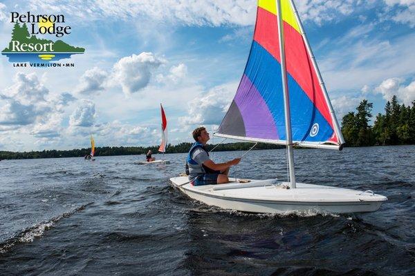 Sailing on our Sunfish - sailing and sailboats are included with cabin rental.