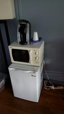 Microwave and fridge in motel 1