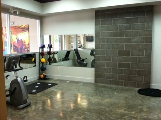 The other half of the rehab space!..with a brick wall.