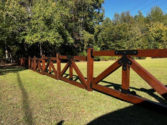 Custom designed, fabricated and installed farm fence.  Laser cut brackets, powdercoated, SUPER NICE!