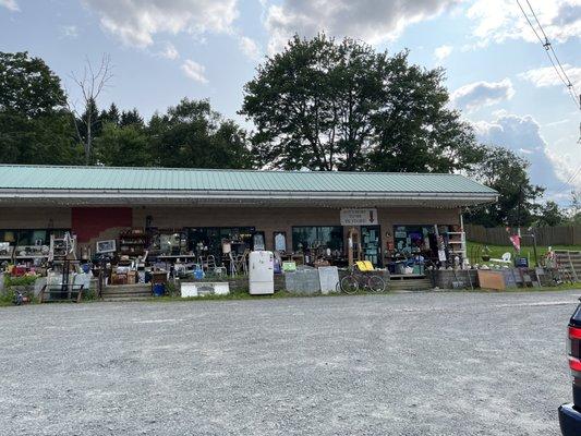 View of the front of the store (entrance on the right, on the porch)