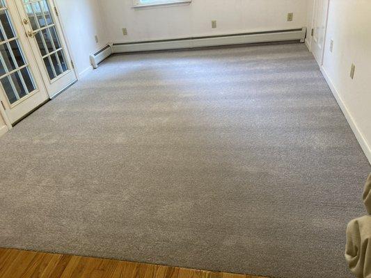 We replaced a section of carpet in our Master Bedroom in our new house. We love how it looks now and it completely freshened up the room!