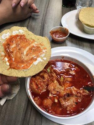 Posole with tostada salsa and cream