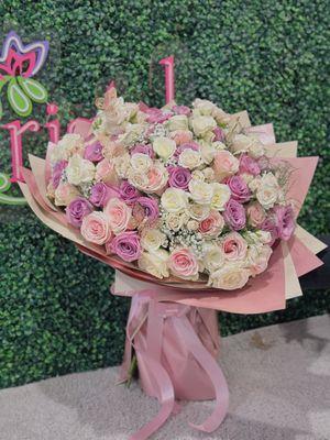 A beautiful arrangement of pastel mix roses wrapped (100roses) perfect for that special person.