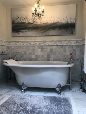 This bathroom is sparkling in Wayne!! Who wouldn't want to take a bath in this tub?!