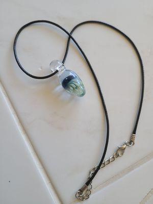 Gorgeous glass blown jellyfish pendent.