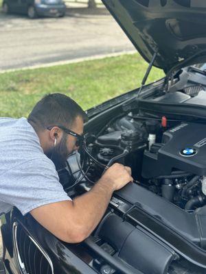 Keoni the car doctor in action