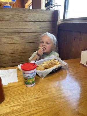 Grandaughter Clair eating from kids menu yum yum