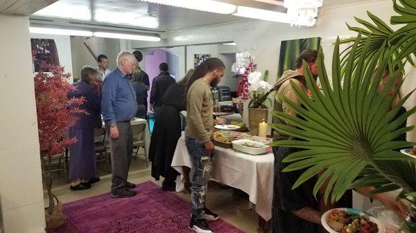 Food and buffet tables. Nila, our pianist against transformed the room into a BEAUTIFUL place.