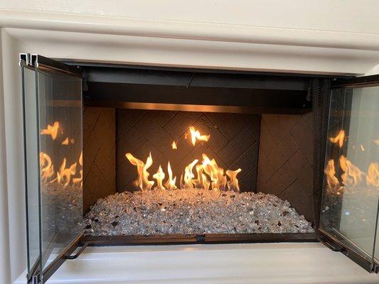 Gas fire with silver and white stones