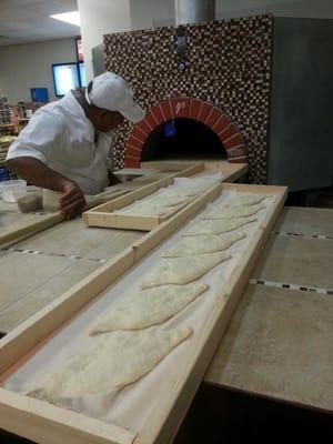 "Hot out of the Brick Oven" freshly baked Breads