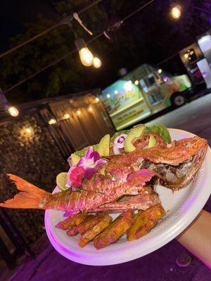 Fried Red Snapper with salad and fried plantains