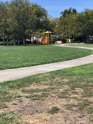 Play structure at the back of the field