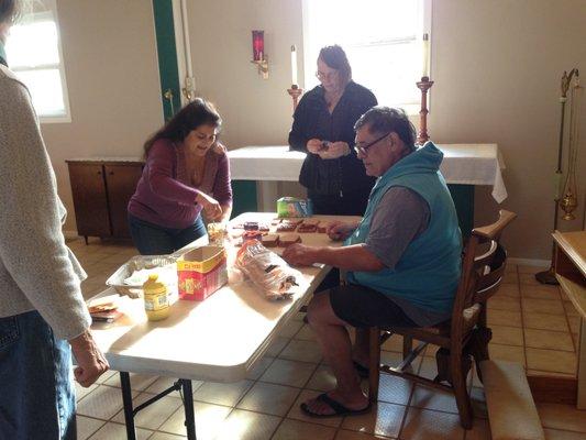 Making sandwiches for the homeless.