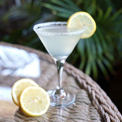 Lemon Drop Martini - vodka, triple sec, fresh lemon juice, a touch of simple syrup, garnished with a sugared rim.