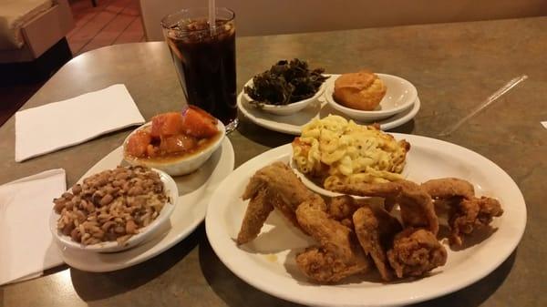 Chicken, mac and cheese, black-eyed peas, candied yams, greens and cornbread. Oh and sweet tea!