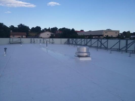 EPS Flute filler with mechanically attached TPO over existing Metal roof. (after)