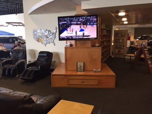 Take in the game while relaxing in one of our comfortable massage chairs or leather couches in our service lounge.