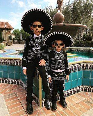 My sons were ring bearers at a dia de Los mueetos themed wedding.