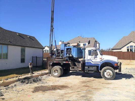 Piers Drilling in a residential area.