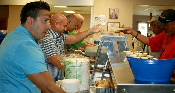 Executive Team serving lunch at Lazarus House in Lawrence MA.