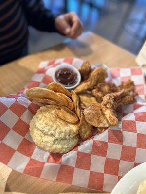 Crispin 4 piece chicken strips with biscuit and house made kettle chips.