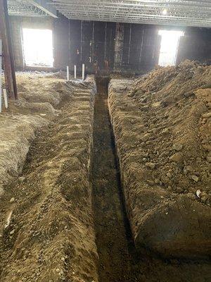 Trenching for underground utilities.