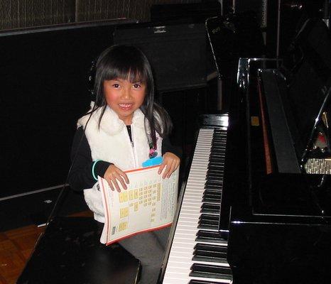 Mikee at her piano lesson for the little ones |